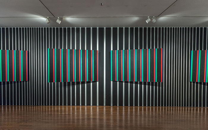 Felipe Pantone, Virtual reconciliation between two perspectives, 2016, Spray paint on wood panel and acrylic on museum wall. Courtesy of the Artist. Photo by Birdman.